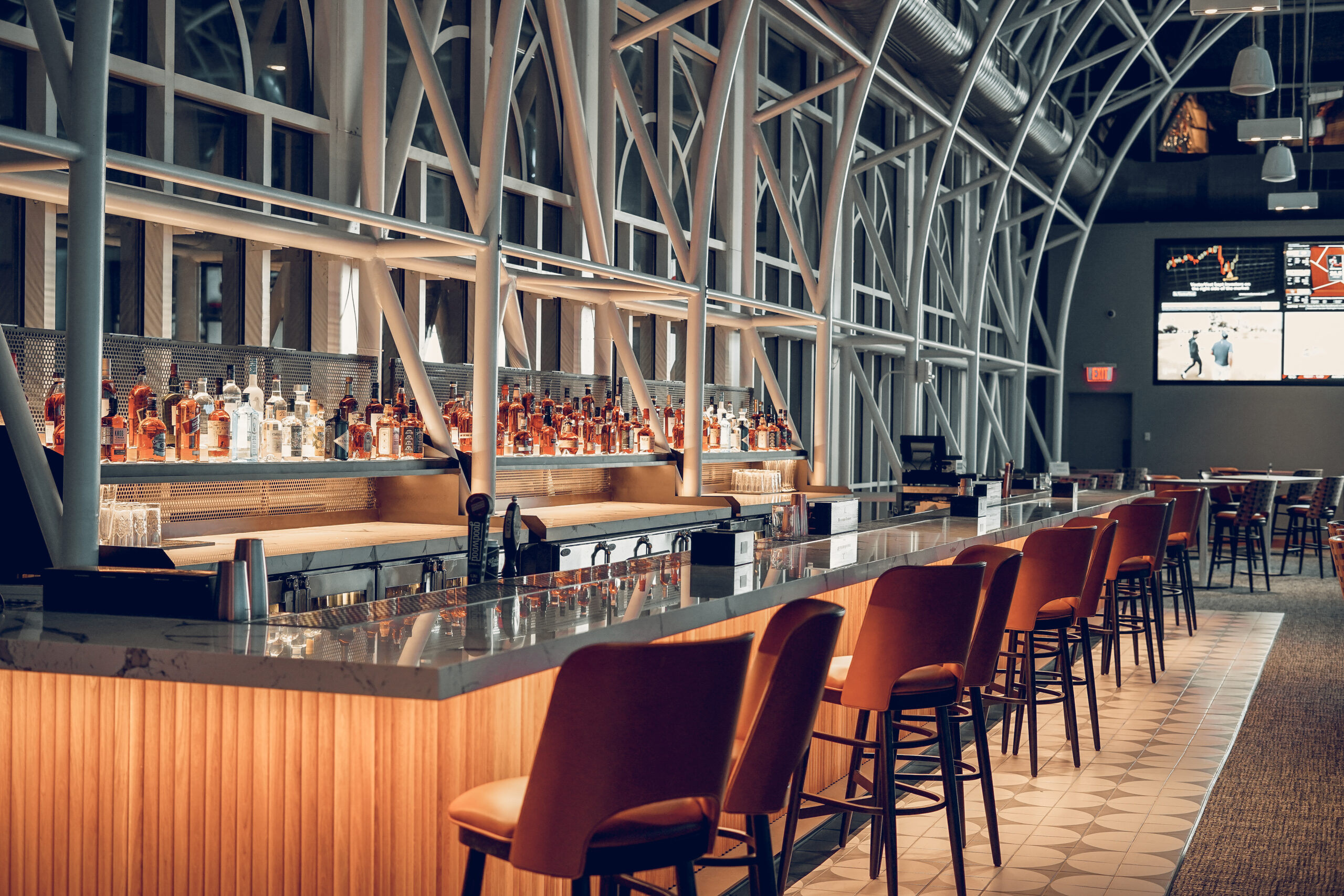 The bourbon bar beneath the Conservatory's glass arches
